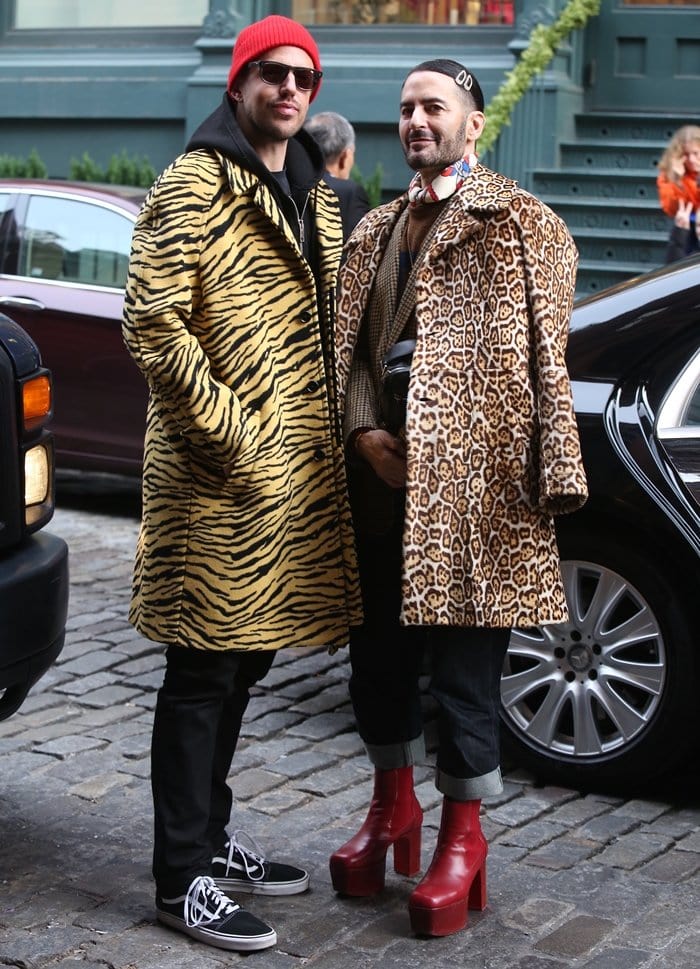 Fashion designer Marc Jacobs (R) is often seen in high heels when out with his husband Charly Defrancesco (L)