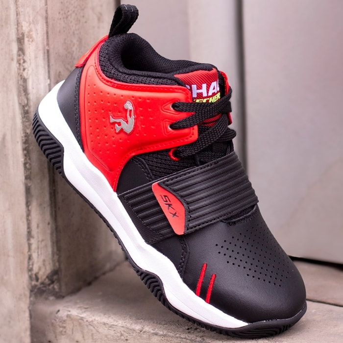 SHAQ by Skechers “Powershot” in red and black — a mid-top basketball sneaker blending bold design with O’Neal’s signature focus on comfort and affordability