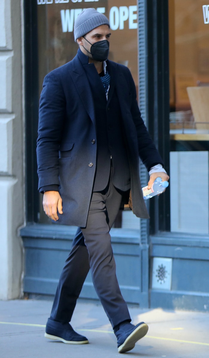 Olivia Palermo's German husband, Johannes Huebl, looks equally stylish in a navy suit and suede loafers