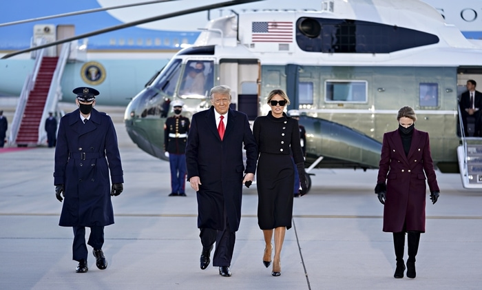 President Donald Trump and First Lady Melania Trump depart the White House for the final time on January 20, 2021, with Melania wearing a sharply tailored black Chanel jacket and skirt paired with classic Christian Louboutin pointed-toe pumps