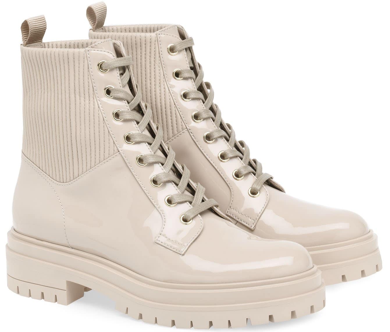 Gianvito Rossi's "Martis" boots in mousse beige patent leather combine polished patent uppers with ribbed knit panels and chunky lug soles