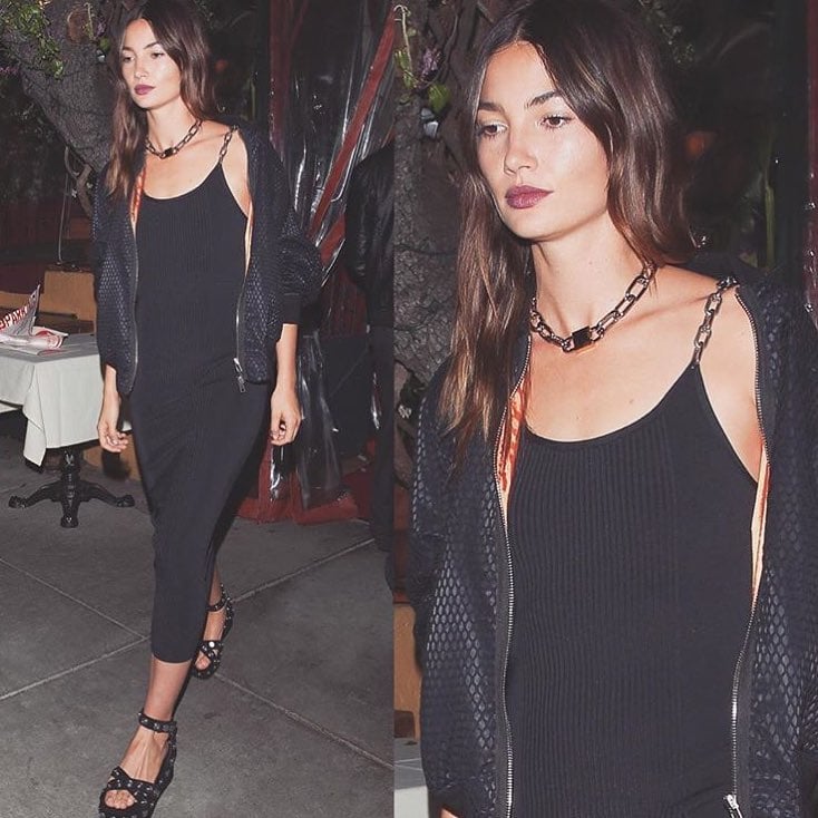 Lily Aldridge steps out in a ribbed black midi dress paired with Alexander Wang “Sandrah” studded platform sandals, giving the minimalist look a bold, edgy finish