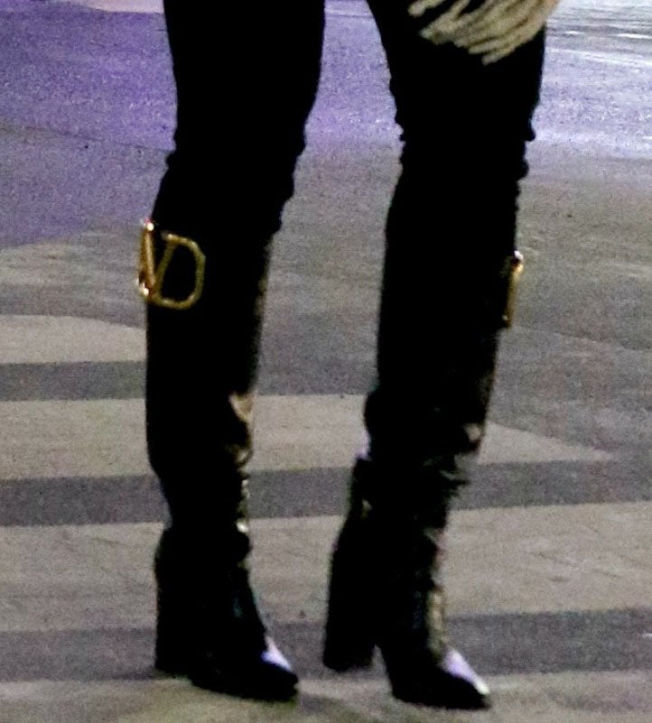 A closer look at Hilary Duff's Valentino Garavani Supervee boots reveals the signature oversized V-logo plaque, sleek leather shaft, and block heel that defined one of Kelsey Peters' standout final-season accessories