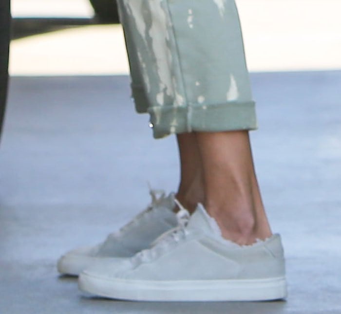 Alessandra Ambrosio wearing gray suede Common Projects Retro Low shearling-lined sneakers