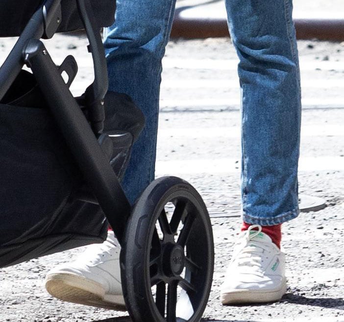 Emily Ratajkowski wears white Reebok Club C 85 Vintage sneakers with straight-leg jeans and red socks in Tribeca