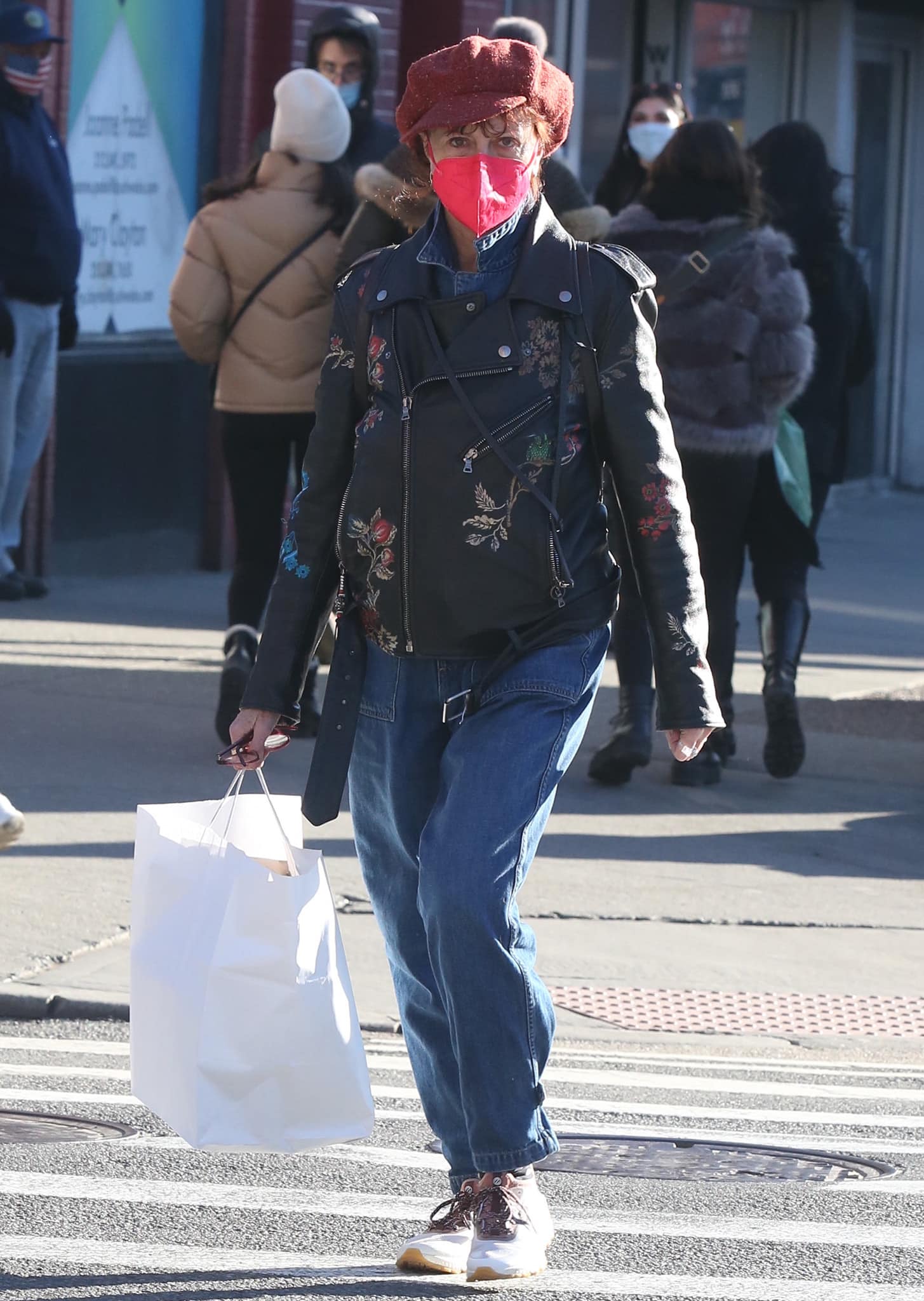 Susan Sarandon brings her signature eccentric cool to Soho, layering denim overalls and a floral moto jacket with performance-driven Cole Haan ZERØGRAND Overtake sneakers for an effortlessly functional off-duty look