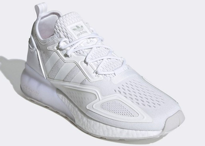 The Adidas Originals ZX 2K Boost blends retro ZX running heritage with modern comfort, featuring breathable mesh, sculpted overlays, and a plush full-length Boost midsole