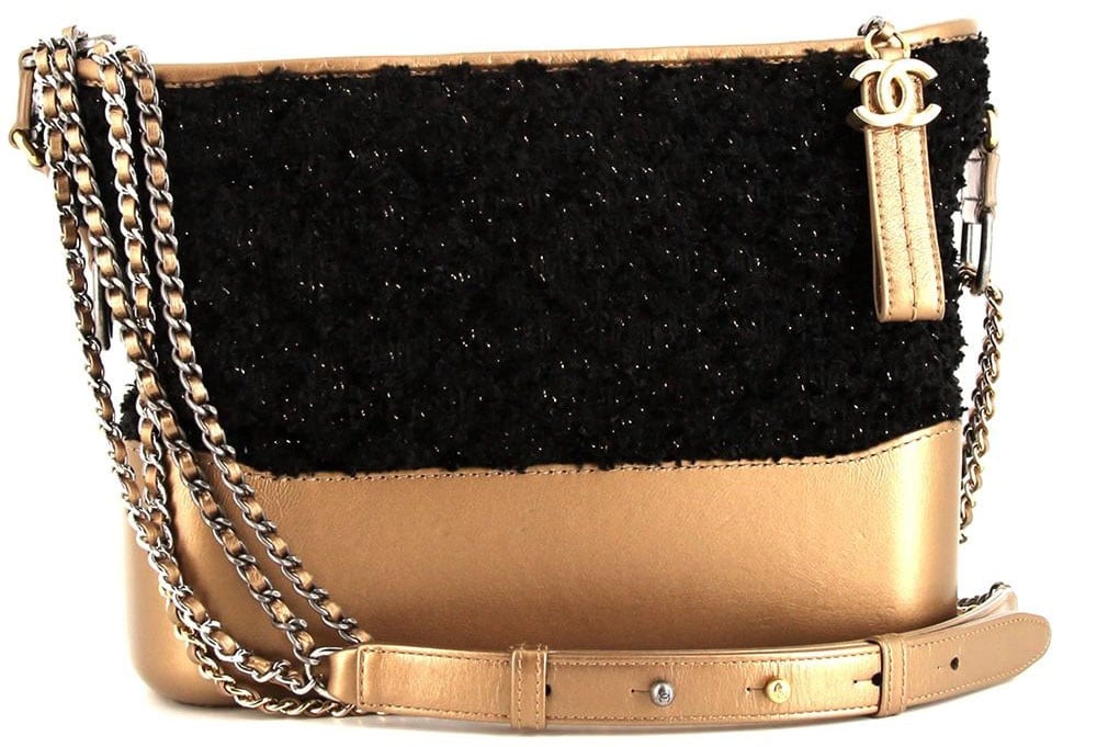 This hobo-style Gabrielle bag is crafted from a combination of gold-tone leather and black canvas tweed