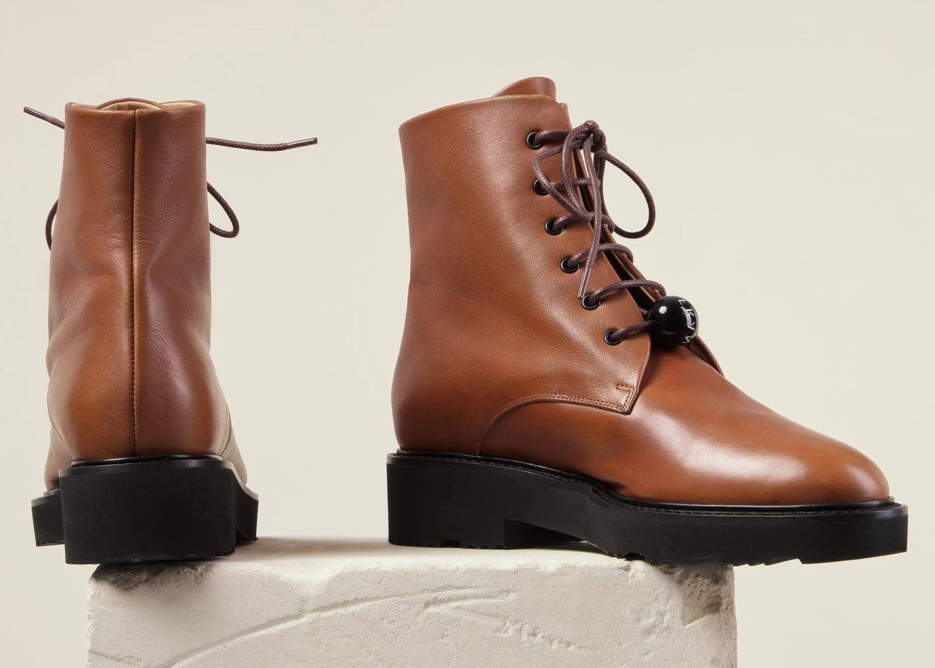 The Dear Frances “Park” boots combine supple tan leather with a lightweight lug sole for a minimalist take on utilitarian footwear