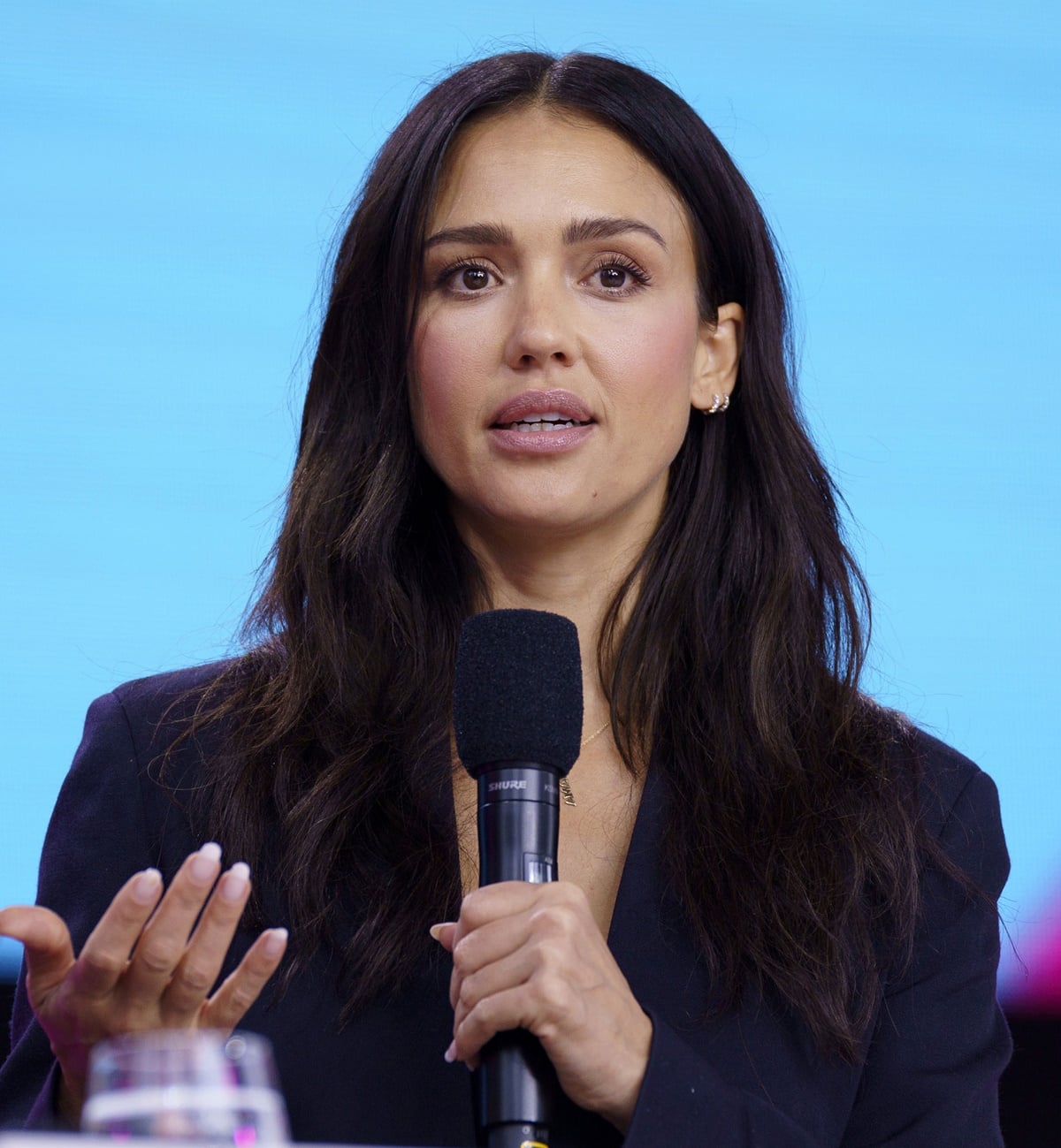 Jessica Alba delivers a keynote at the Digital X event in Cologne, Germany, on September 14, 2022, pairing her polished look with effortless waves and minimal jewelry
