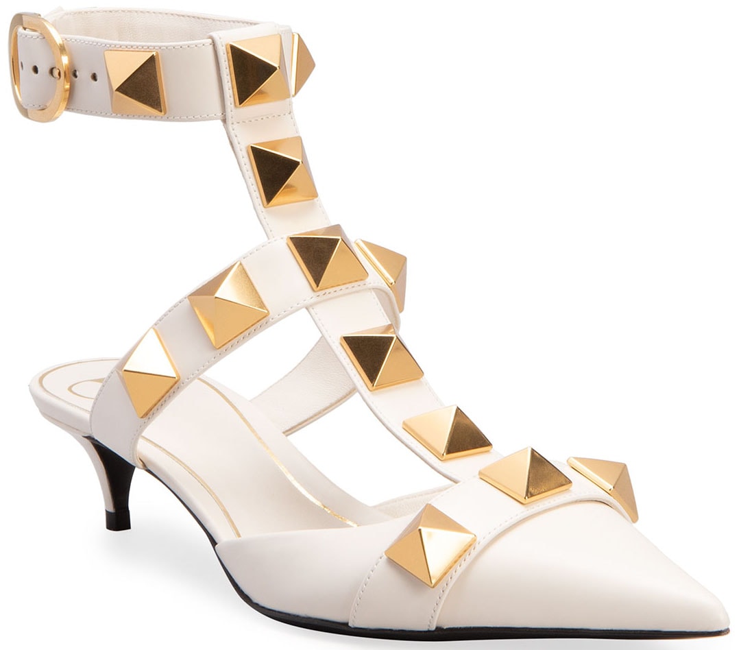 Valentino Garavani Roman Stud kitten-heel pumps in light ivory with oversized pyramid studs and T-straps
