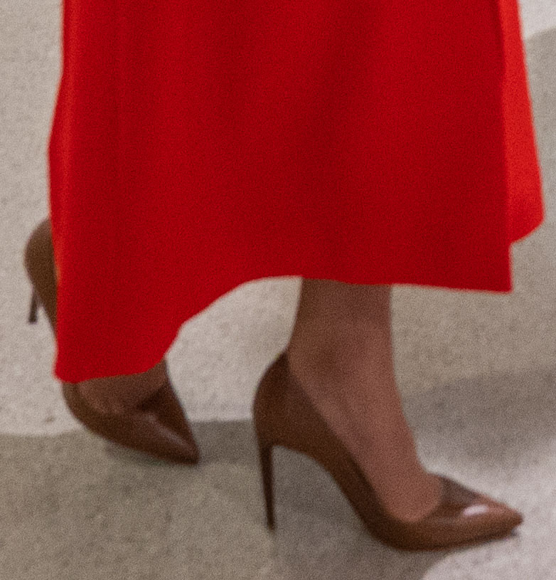 A closer look at Kate Middleton's brown Ralph Lauren "Celia" pumps reveals the pointed-toe silhouette and slender stiletto heel that provided a sophisticated counterpoint to her vibrant Eponine coat dress