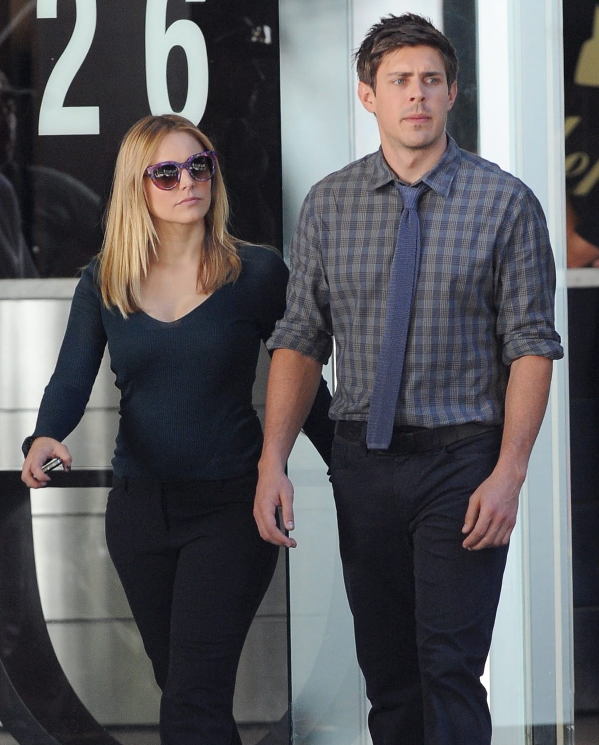 Kristen Bell and Chris Lowell on the set of Veronica Mars, bringing their characters' dynamic partnership to life