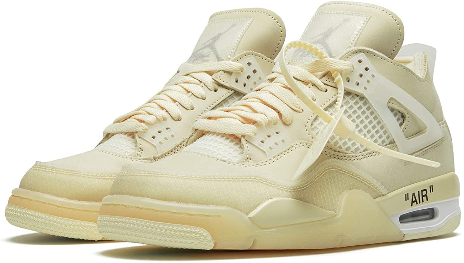 The Off-White x Air Jordan 4 “Sail” reworks the classic basketball silhouette in layered cream tones with translucent mesh and Virgil Abloh’s signature “AIR” branding