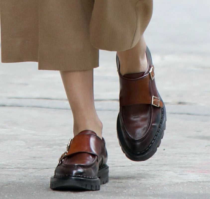 Olivia Palermo’s two-tone Santoni leather loafers combine double-buckle monk straps with almond toes and substantial lugged soles