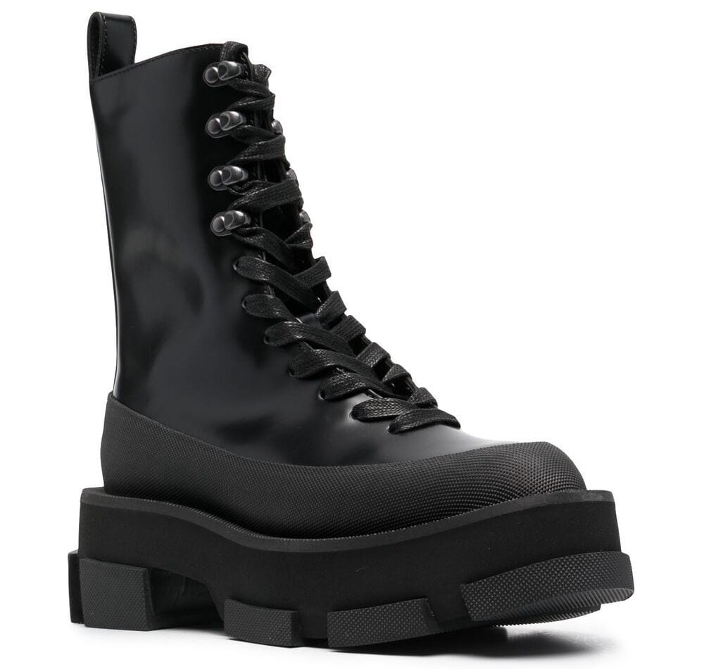 The Both Gao silhouette reimagines the classic combat boot through a sculptural lens, combining glossy leather, textured rubber panels, and a split platform outsole that has become a signature feature of the Paris-based label