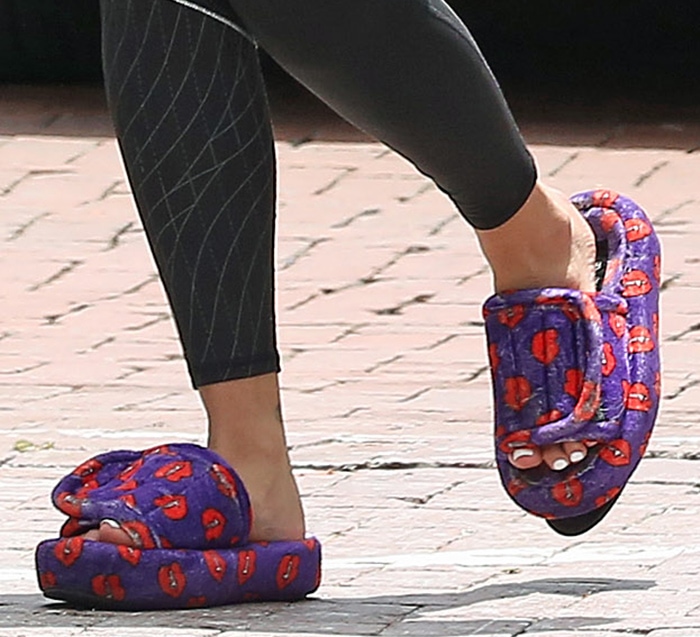 Dua Lipa completes her comfy look with Natasha Zinko fang-print slides
