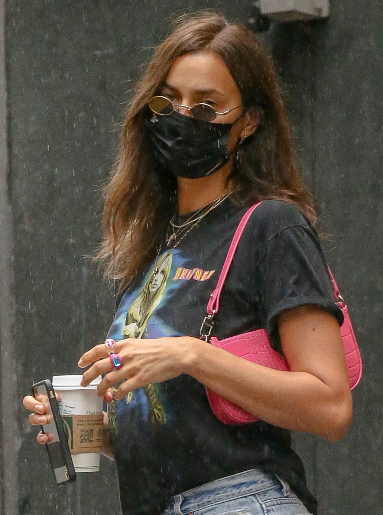 Irina Shayk adds color to her rock 'n' roll look with pink By Far shoulder bag