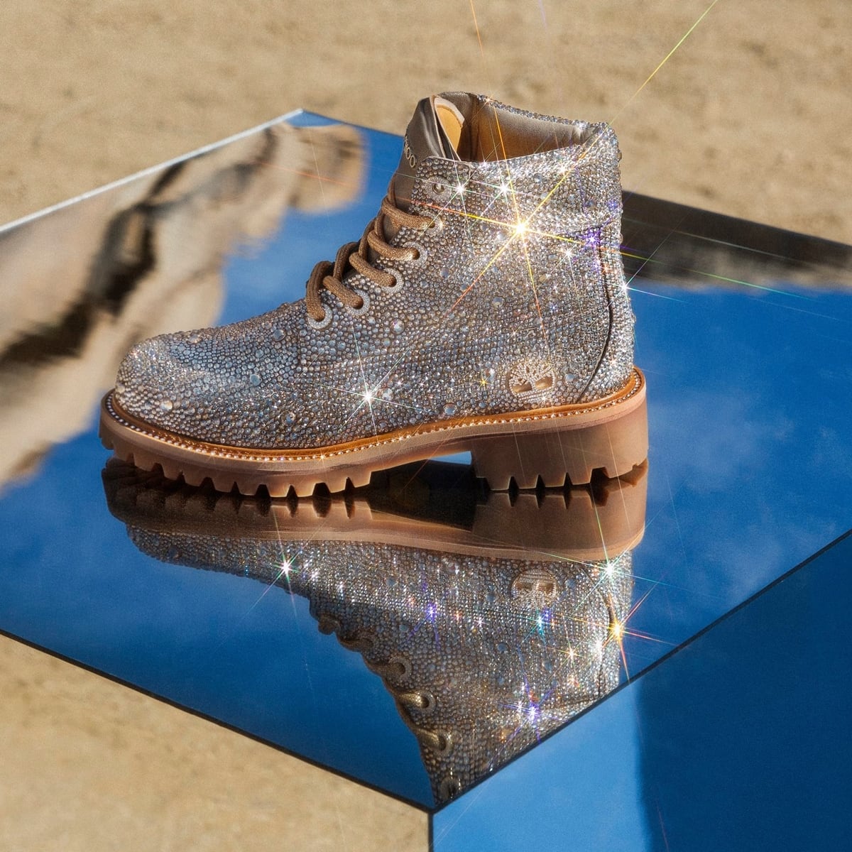 The most dramatic style in the collaboration, this all-over crystal-covered Jimmy Choo × Timberland boot transforms the classic work boot into a statement luxury piece