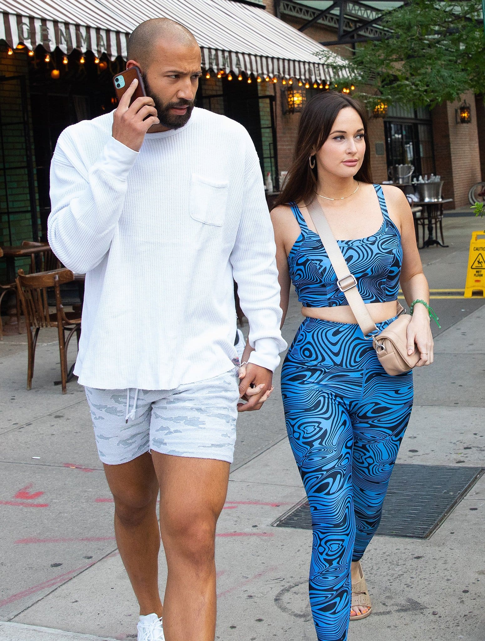 Kacey Musgraves demonstrates her relaxed summer style in a blue swirl-print matching set