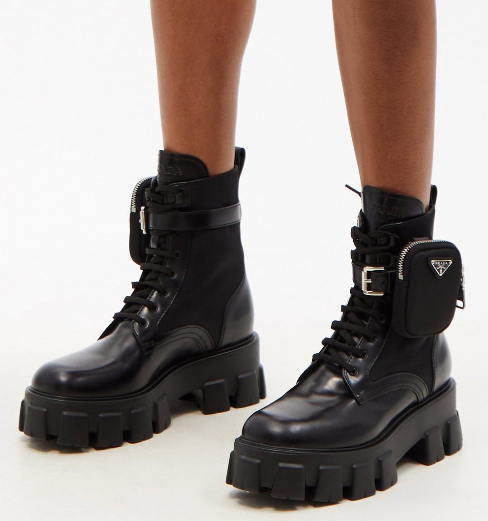 A pair of Prada military-inspired boots with a detachable pouch and chunky lug soles