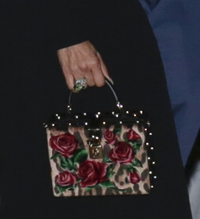 Jennifer Lopez carries her night essentials in a Dolce Gabbana leopard and floral velvet box bag