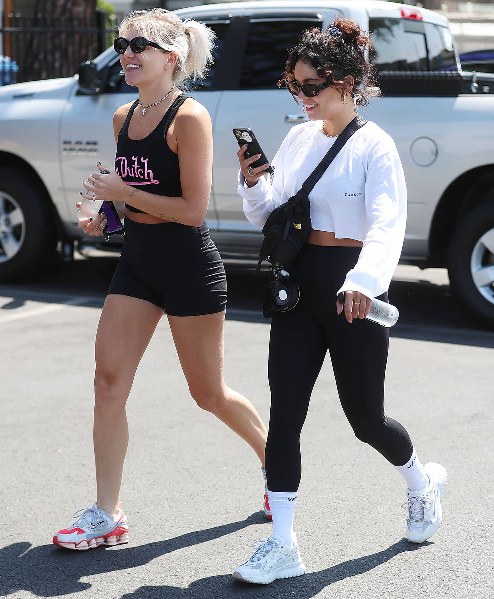 Vanessa Hudgens and GG Magree step out in Studio City on June 28, 2021, pairing sleek black athleisure with chunky white sneakers for an easy off-duty look