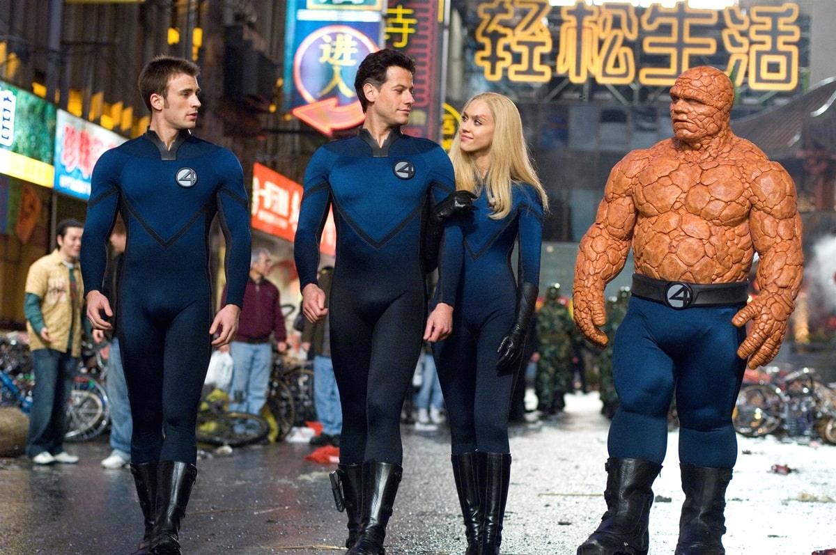 Chris Evans, Ioan Gruffudd, Jessica Alba, and Michael Chiklis suit up in coordinating blue-and-black costumes with sleek black boots while filming Fantastic Four: Rise of the Silver Surfer (2007)
