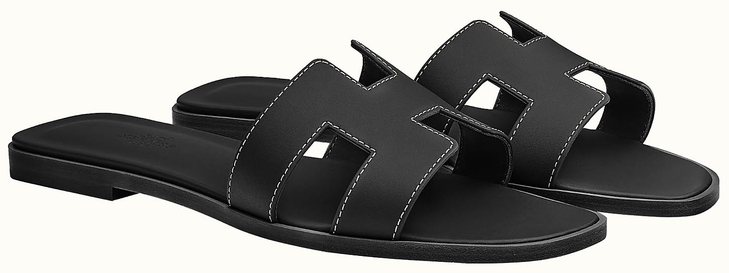 Introduced in 1997 by Pierre Hardy, the Hermès Oran sandal has become a modern classic, with its signature H-shaped cutout strap helping define luxury warm-weather dressing for nearly three decades