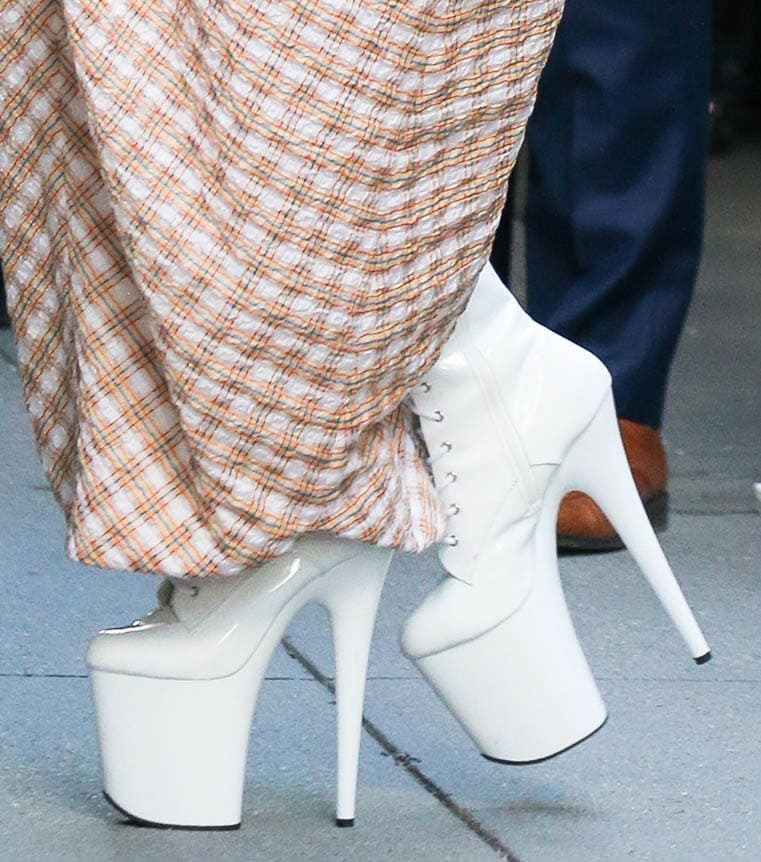 Lady Gaga pairs her unique dress with towering platform boots from Pleaser Shoes