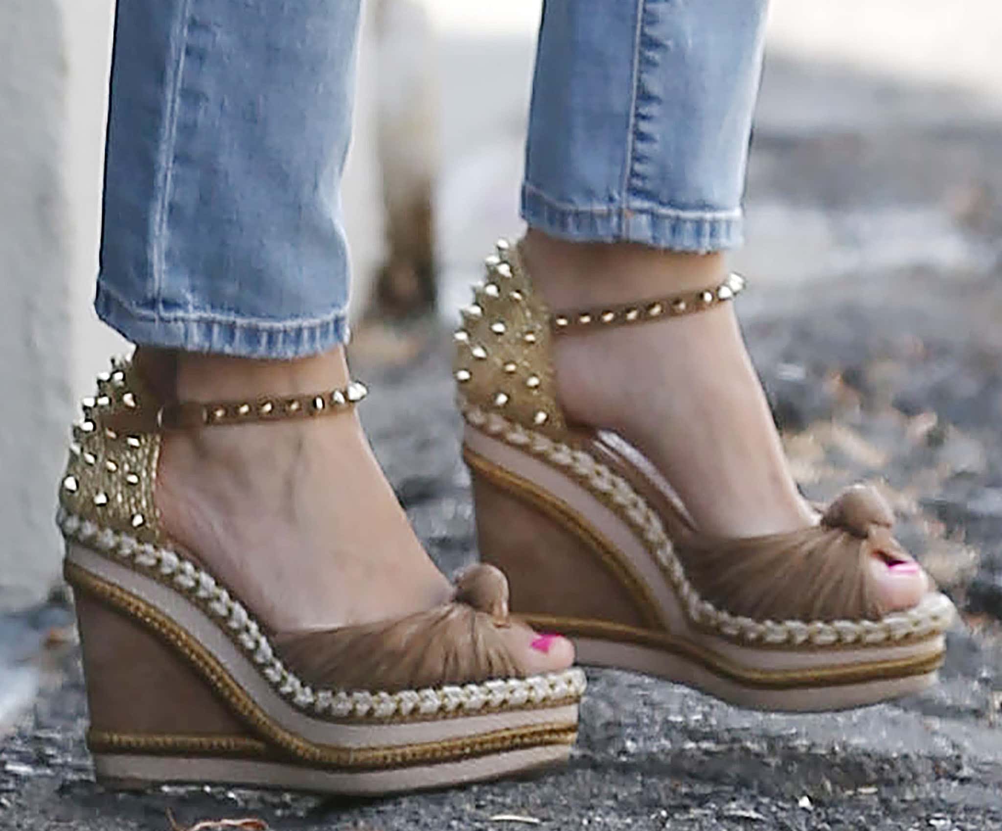 Sofia Vergara wears brown Christian Louboutin Madcarina espadrille wedge sandals with spiked ankle straps