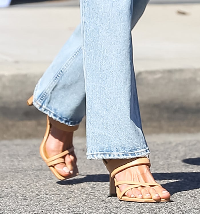 Alessandra Ambrosio wears tan Gia Borghini Gia 11 sandals with a square toe and toe-ring straps