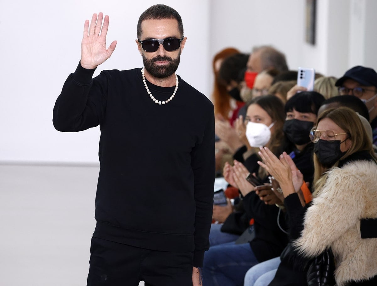 Giambattista Valli, the Rome-born fashion designer, takes his runway bow following a show presentation