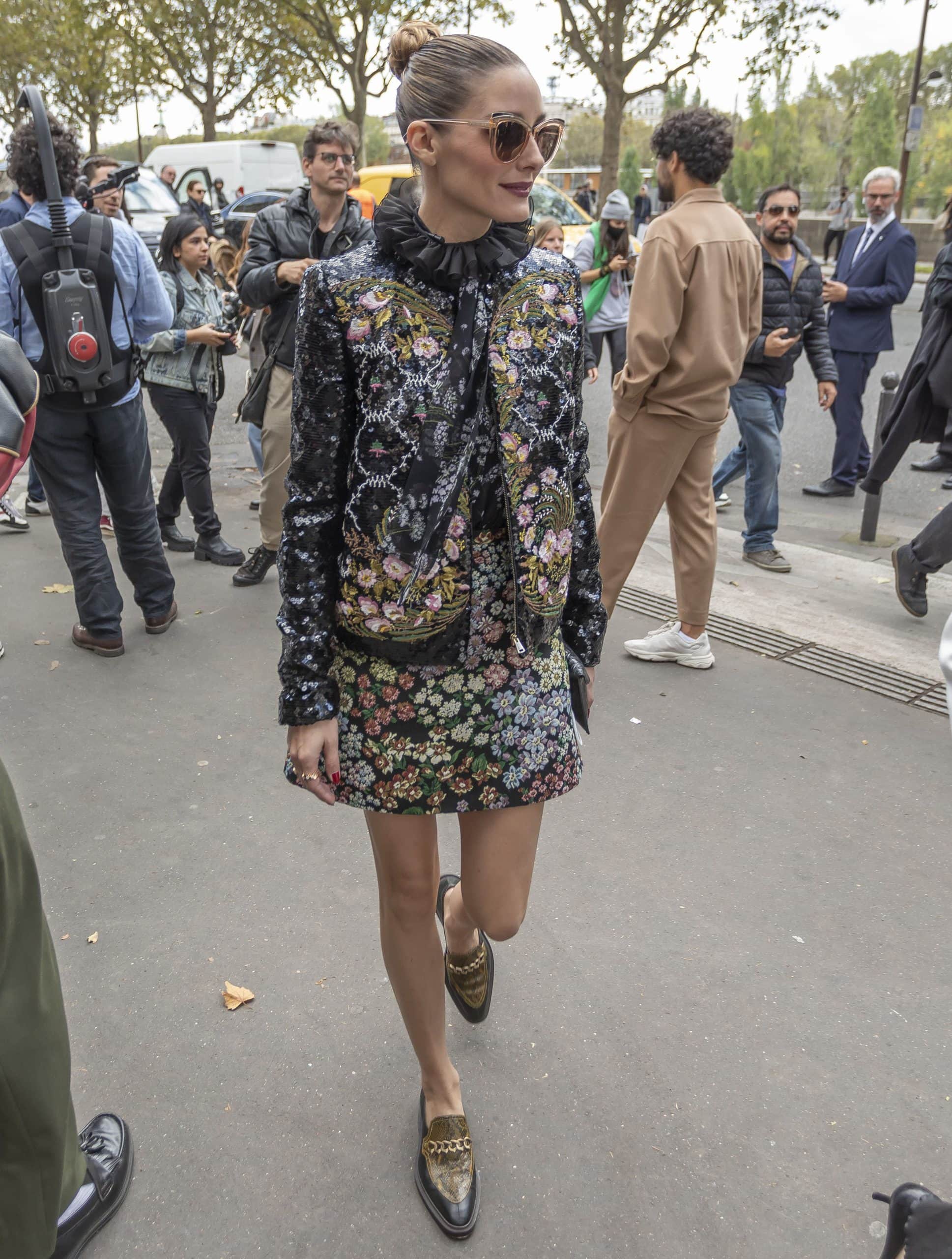 Olivia Palermo shows off her legs in a Giambattista Valli Fall 2021 floral jacquard mini skirt and jacket