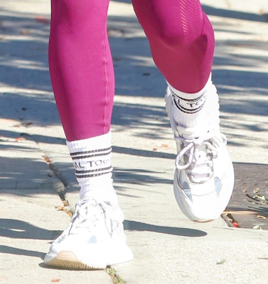 Vanessa Hudgens finishes her gym-ready look with crisp white Mercer Amsterdam “Jupiter” sneakers, grounding her vibrant leggings with a clean, sporty silhouette made for off-duty movement