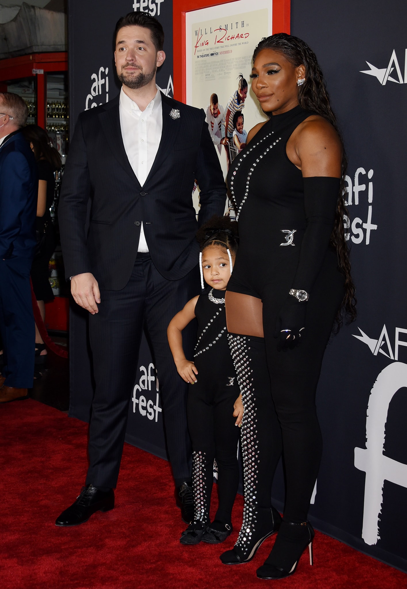 Serena Williams and her daughter Olympia steal the spotlight in matching custom David Koma embellished catsuits featuring sparkling details and coordinating one-legged designs