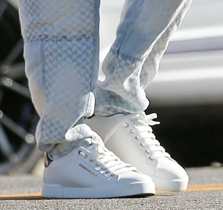 Dolce Gabbana's white Portofino sneakers added a crisp, minimalist finish to Heidi Klum's relaxed luxury outfit, contrasting the statement heels she wore just days earlier