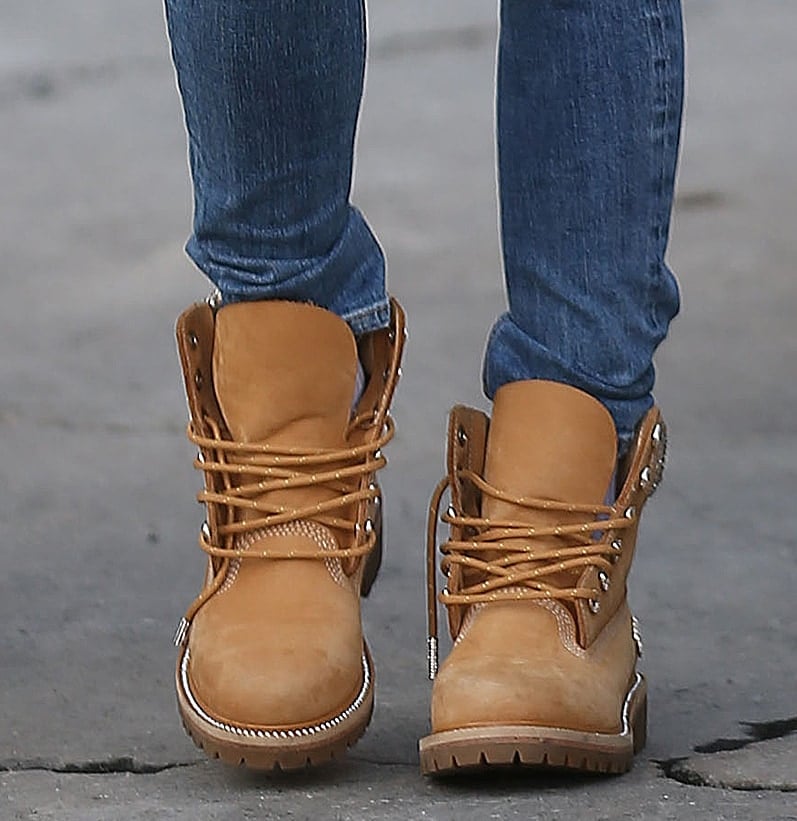 Jennifer Lopez channels her Jenny From the Block era in crystal-embellished Timberland x Jimmy Choo boots that transform the classic wheat work boot into a rugged-glam statement
