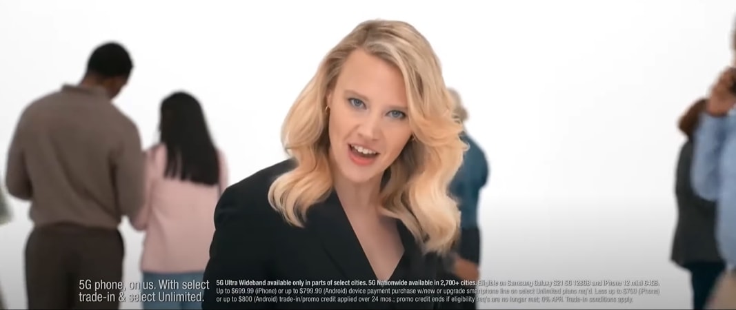 Commanding the camera with her trademark intensity, Kate McKinnon blends business chic and bold femininity, pairing structured tailoring with bright red stilettos that steal the spotlight