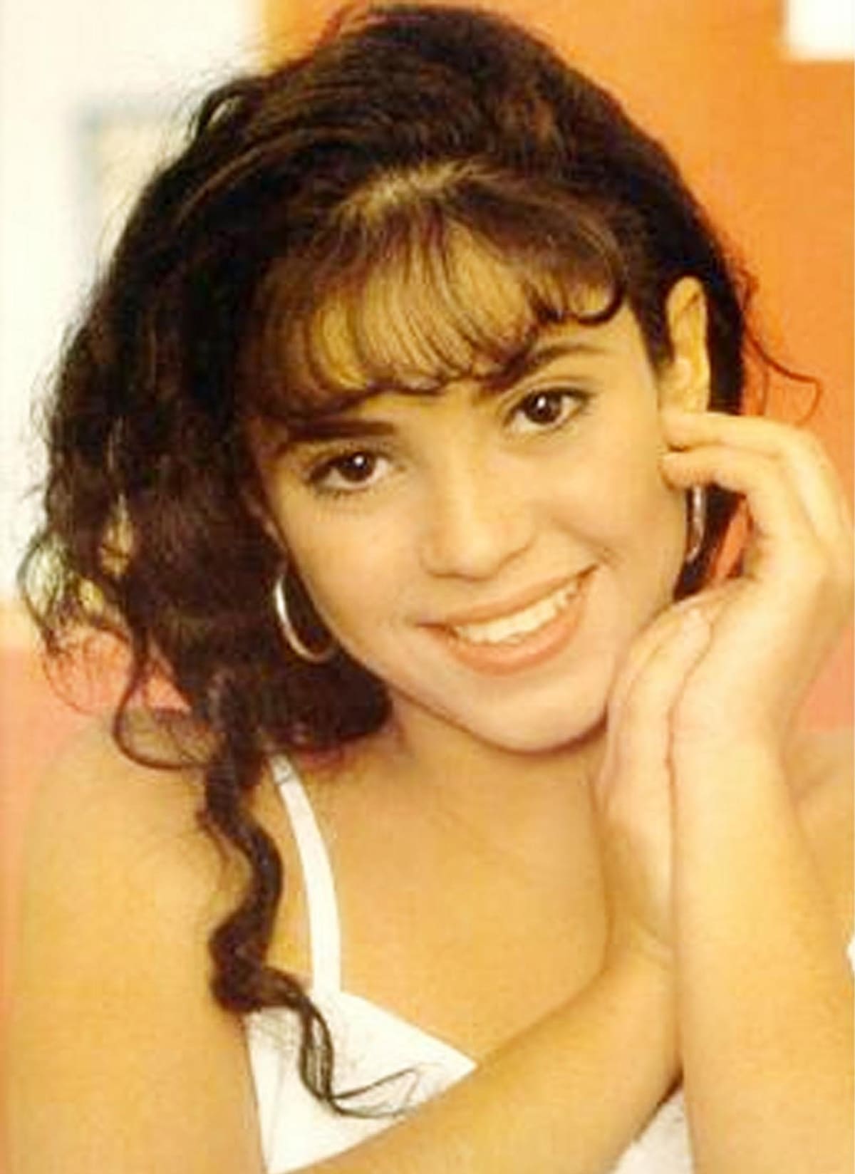 A teenage Shakira smiles in a rare throwback photo — long before her signature heels and hip-shaking style made her a global pop icon