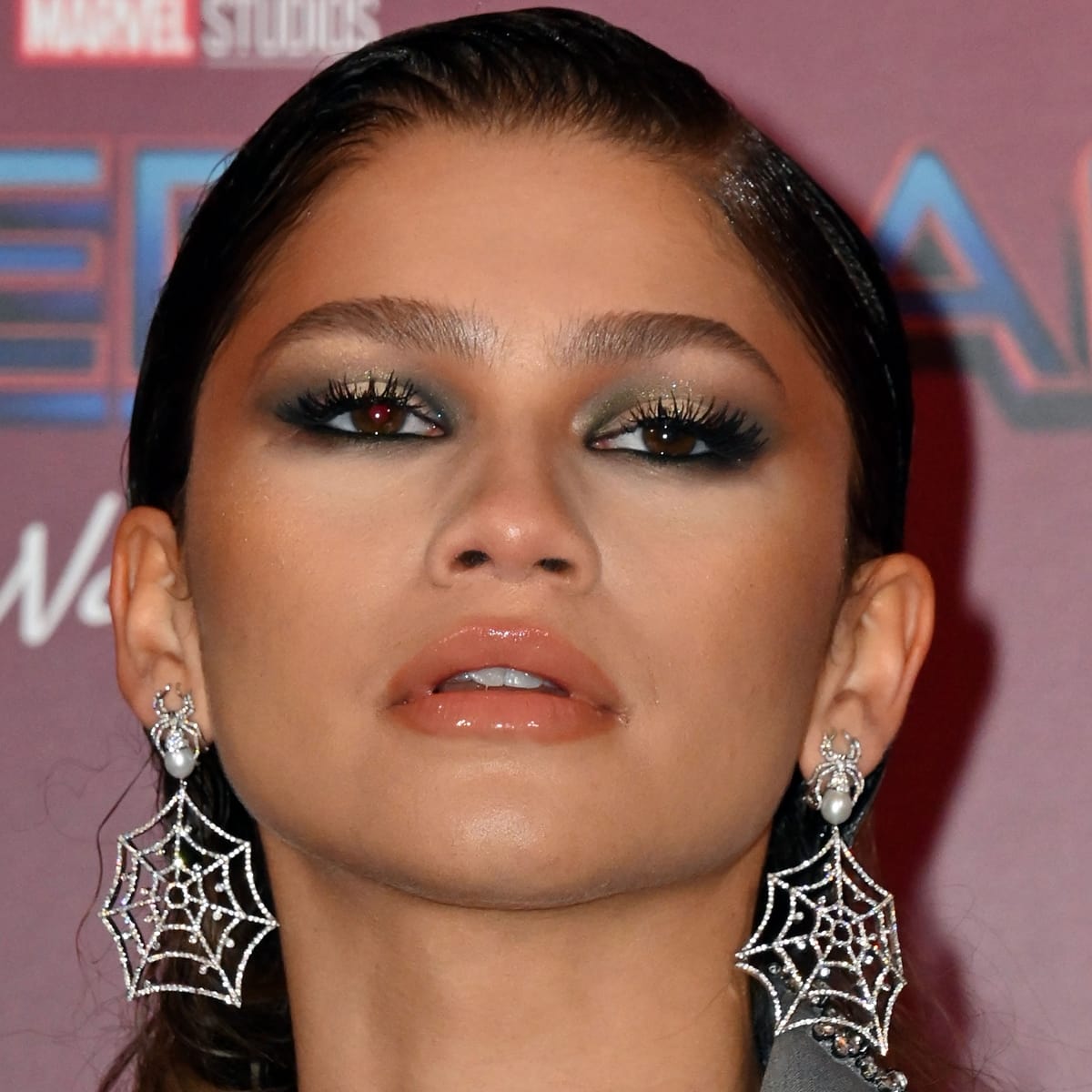 Zendaya's spiderweb earrings by Jacob Co. feature two white pearl-and-diamond spiders