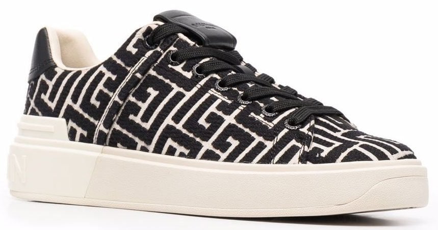 These Balmain B-Court sneakers are easily recognizable with a monogram design, an embossed rubber logo at the back of the sole, and 'B' at the heel counter