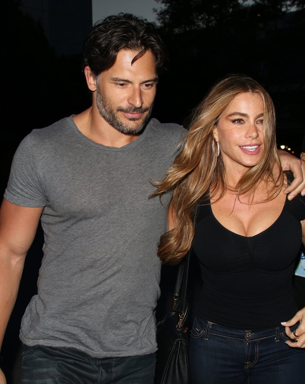 Joe Manganiello in a simple grey tee and Sofía Vergara in a sleek black top, radiating relaxed style and natural chemistry