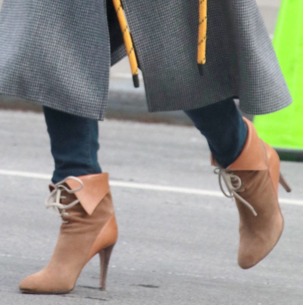 Nicky Hilton’s Chloé “Catlyn” ankle boots feature folded leather cuffs, contrasting laces, almond-shaped toes, and stacked block heels
