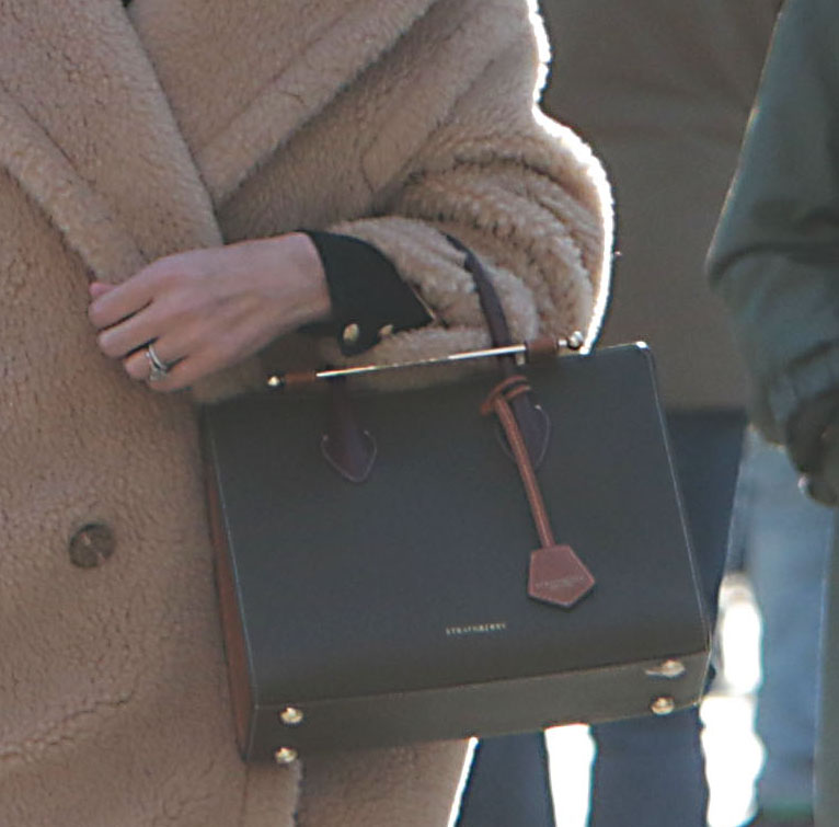 Nicky Hilton adds luxe to her cozy, casual wear with a Strathberry Midi tote