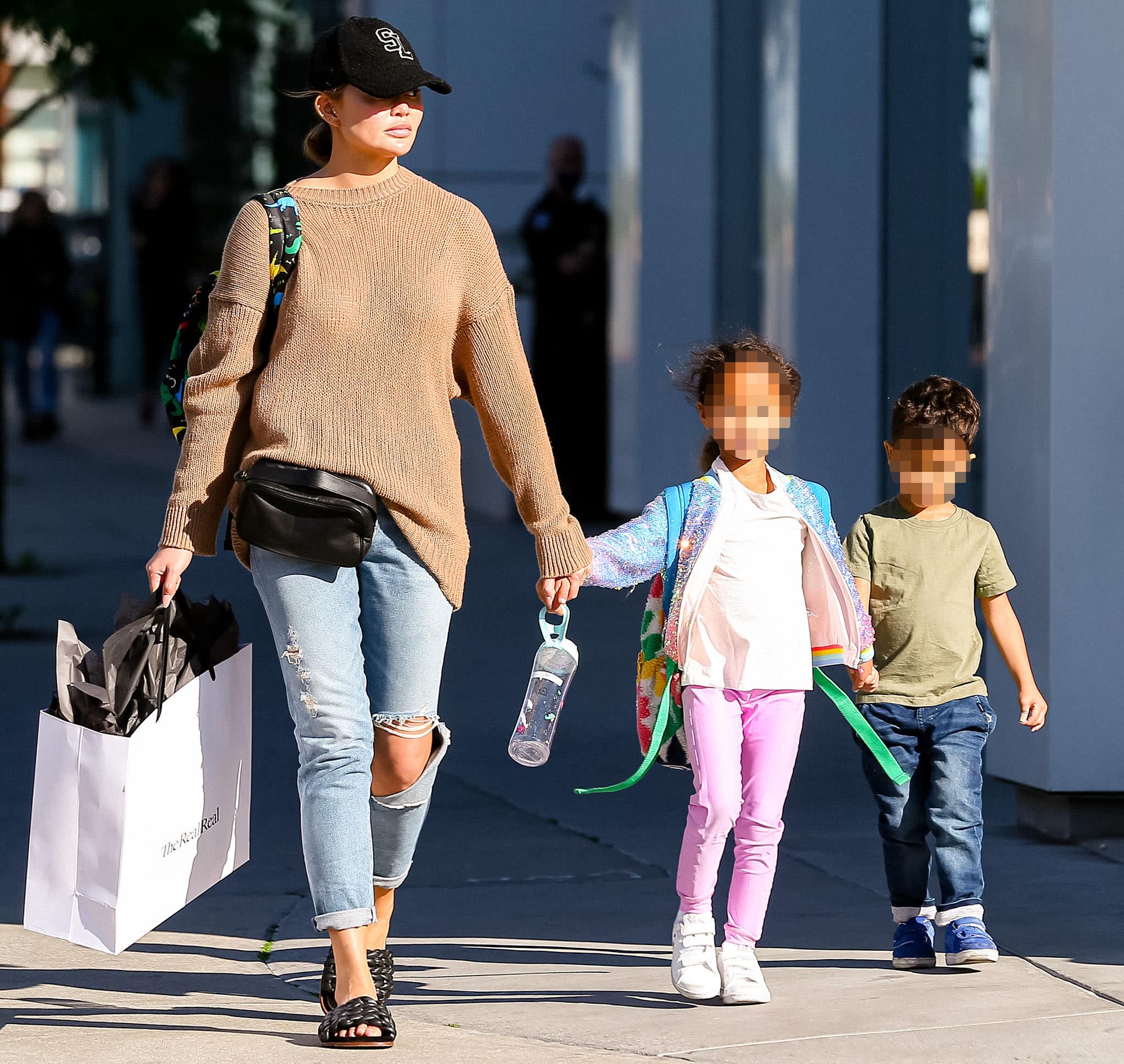 Chrissy Teigen steps out for a shopping trip in West Hollywood on February 16, 2022, keeping her look casual and comfortable while spending time with her children, Luna and Miles