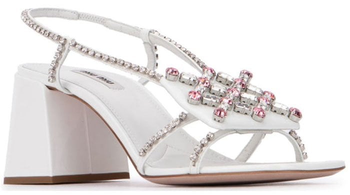 Made in Italy from white leather, these Miu Miu sandals with crystal-embellishments and block heels can elevate even the simplest wedding dress