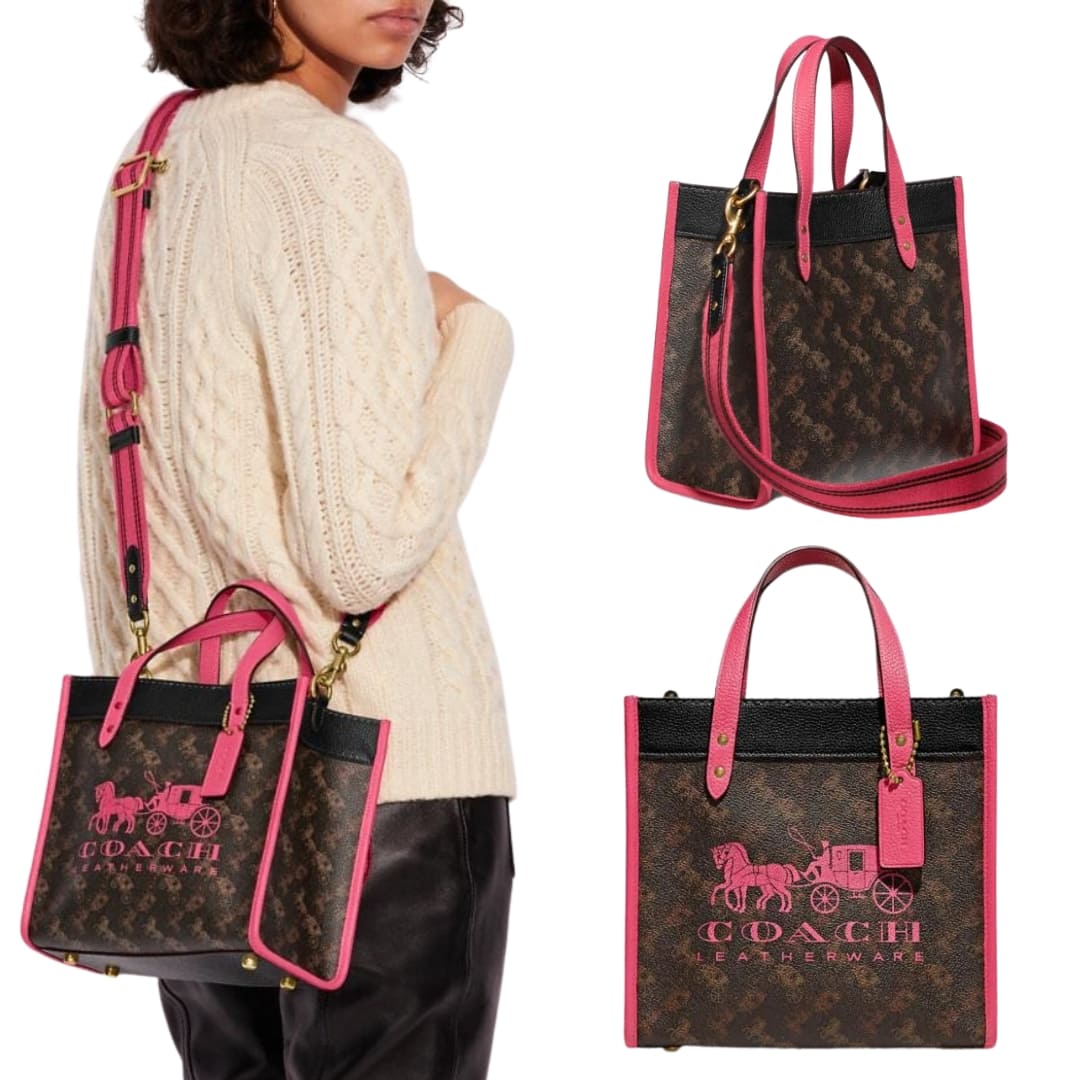 Coach Field Tote 22 in Signature canvas with pink leather trim and Horse-and-Carriage logo, styled crossbody with the detachable strap