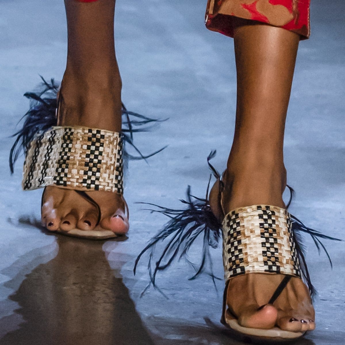 A model walks the runway in woven fringe-embellished sandals from the Prabal Gurung collection during New York Fashion Week on February 10, 2019, in New York City