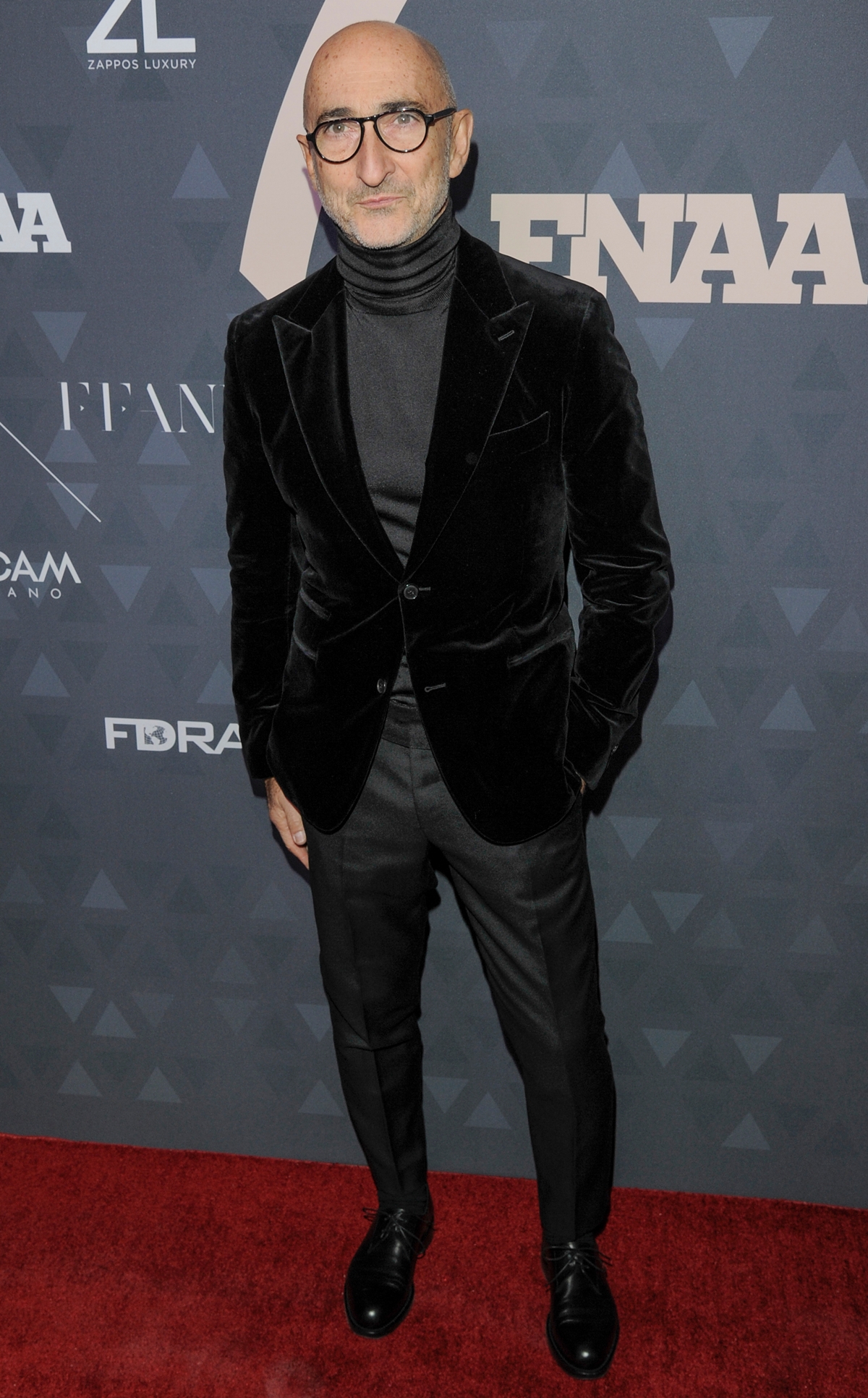 Pierre Hardy attends the FNAA Awards in a velvet blazer and turtleneck, embodying the refined, architectural aesthetic that has defined his luxury footwear label for more than two decades